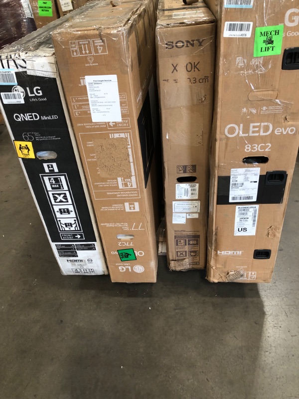 Photo 2 of MIXED PALLET OF DAMAGED TVS**NON FUNCTIONAL SET OF 4** NO REFUNDS