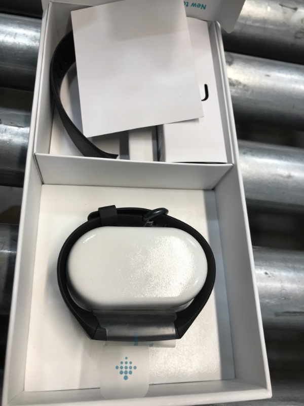 Photo 1 of Fitbit Charge 4 Black Advanced Fitness Tracker