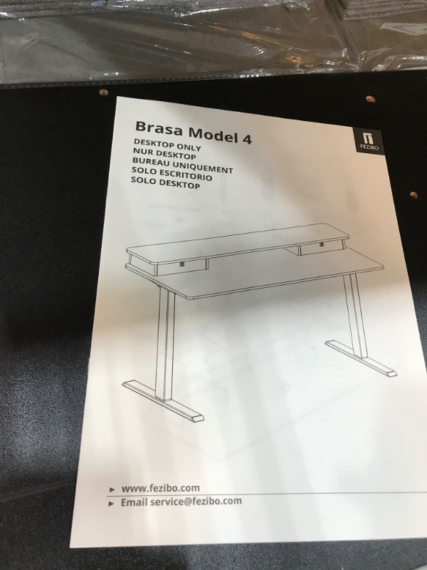 Photo 6 of NOT A COMPLETE SET MISSING OTHER BOX DESK ONLY NOT FRAME 
FEZIBO Height Adjustable Electric Standing Desk with Double Drawer, 55 Inch Stand Up Table with Storage Shelf, Sit Stand Desk with Splice Board, Black Frame/Black Top
