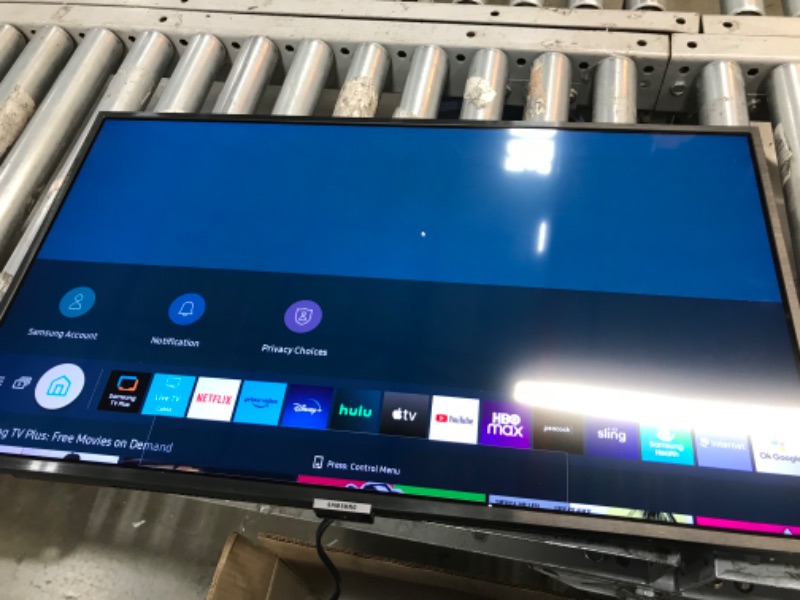 Photo 2 of SAMSUNG 32-Inch Class QLED Q60A Series - 4K UHD Dual LED Quantum HDR Smart TV with Alexa Built-in (QN32Q60AAFXZA, 2021 Model) 32 in TV Only