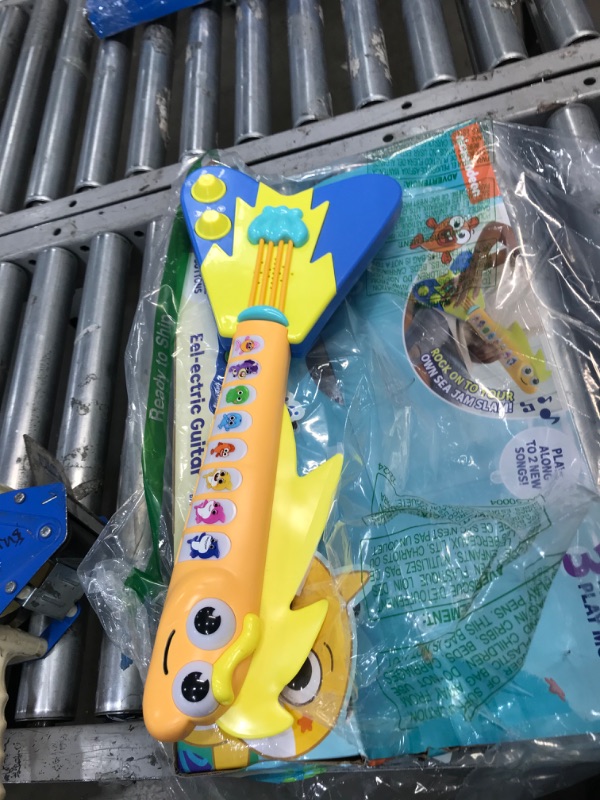 Photo 2 of Baby Shark's Big Show! EEL-ectric Guitar – Interactive Musical Toys for Toddlers – Lights and Sounds Toy Guitar