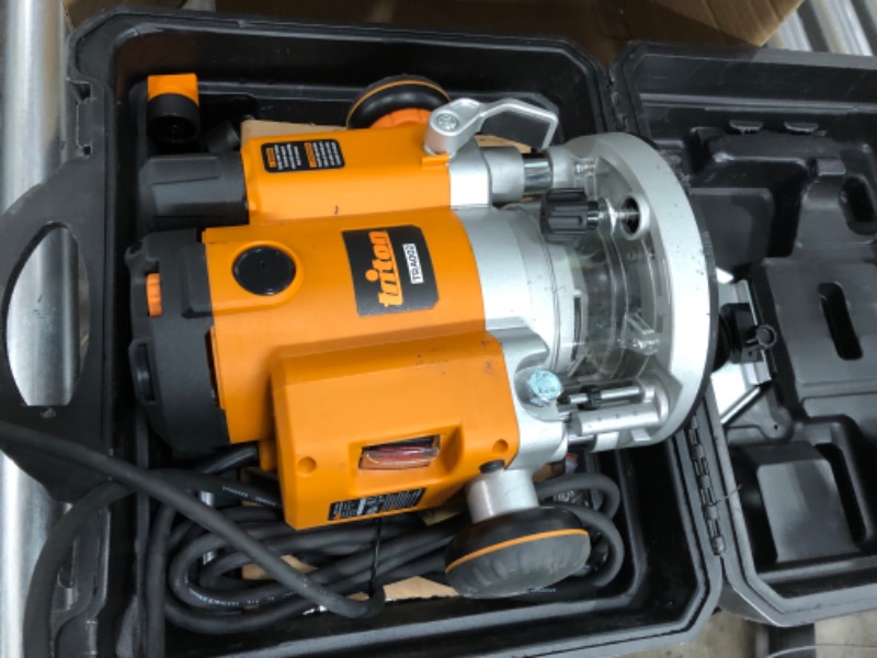 Photo 3 of ***NON-FUNCTIONAL*** TRITON TRA002KIT 3-1/4 HP, 15 Amp Dual Mode Precision Plunge Router with Built-In Router Lift and Accessories, Orange
