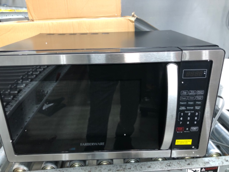 Photo 6 of **PARTS ONLY** Farberware Countertop Microwave 1.1 Cu. Ft. 1000-Watt Compact Microwave Oven with LED lighting, Child lock, and Easy Clean Interior, Stainless Steel Interior & ExteriorLPNPMOI7010427
