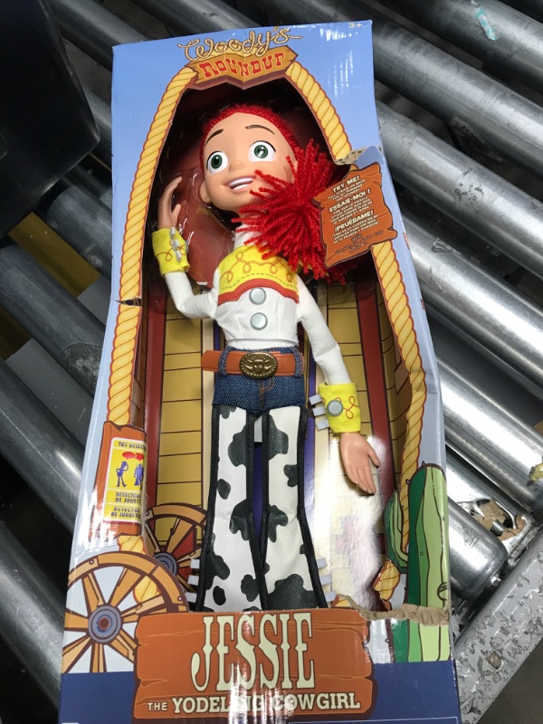 Photo 2 of Disney Store Official Jessie Interactive Talking Action Figure from Toy Story, 15 Inches, Features 10+ English Phrases & Sounds, Interacts with Other Figures and Toys, Removable Hat, Ages 3+
