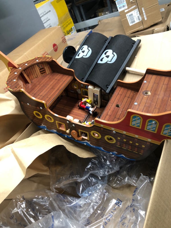 Photo 3 of KidKraft Adventure Bound™: Wooden Pirate Ship Play Set with Lights and Sounds, Pirate Figures, 8 Pieces Included, Gift for Ages 3+
