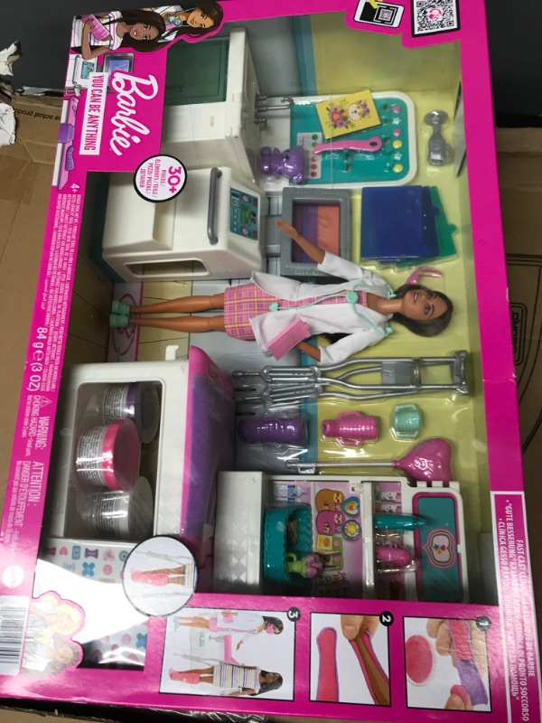 Photo 2 of Barbie Fast Cast Clinic Playset, Brunette Doctor Doll (12-in), 30+ Play Pieces, 4 Play Areas, Cast & Bandage Making, Medical & X-ray Stations, Exam Table, Gift Shop & More, Great Toy Gift