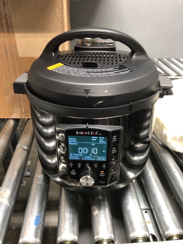Photo 1 of Instant Pot Pro 10-in-1 Pressure Cooker, Slow Cooker, Rice/Grain Cooker, Steamer, Sauté, Sous Vide, Yogurt Maker, Sterilizer, and Warmer, Includes App With Over 800 Recipes, Black, 6 Quart