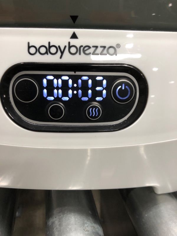 Photo 3 of Baby Brezza Bottle Sterilizer and Dryer Advanced – HEPA Filter And Steam Sterilization – Dries 33 Percent Faster Then Original - Universal Fit up to 8 Baby Bottles And 2 Sets of Pump Parts (Any Brand)
