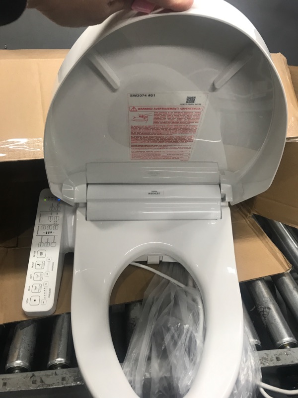 Photo 3 of *** POWERS ON *** TOTO SW3074#01 WASHLET C2 Electronic Bidet Toilet Seat with PREMIST and EWATER+ Wand Cleaning, Elongated, Cotton White C2 Elongated Cotton White