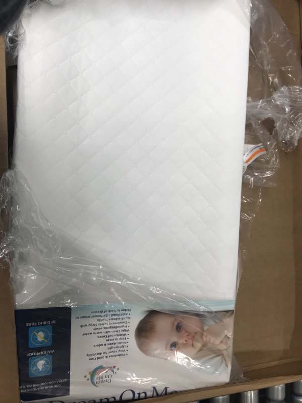 Photo 3 of DAMAGED, SEE PHOTOS
Dream On Me Two Sided Contour Changing Pad 2022, White, Lightweight with Non Skid Bottom, Convenient Safety Strap, Waterproof Vinyl Cover, Phthalate Snow White