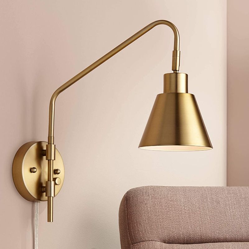 Photo 1 of 
WINGBO Vintage Adjustable Swing Arm Wall Lamp Foldable Gold Wall Light
This classic adjustable swing arm wall sconce, with a traditional jointed arm capped in a sleek cone shade, merges style and functionality for the perfect task lighting ...