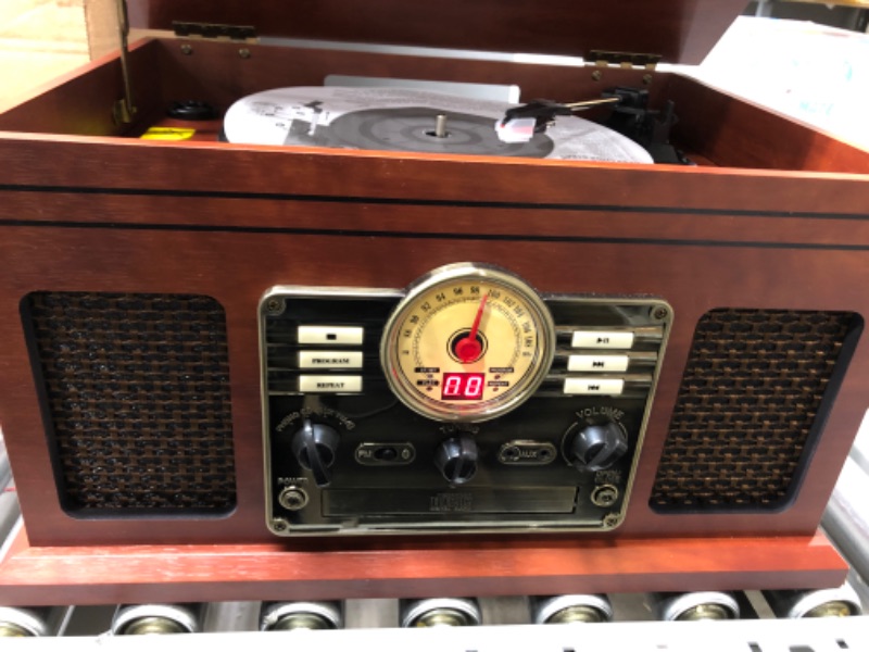 Photo 3 of *Powers On* Victrola Nostalgic 6-in-1 Bluetooth Record Player & Multimedia Center with Built-in Speakers - 3-Speed Turntable, CD & Cassette Player, FM Radio | Wireless Music Streaming | Mahogany Mahogany Entertainment Center