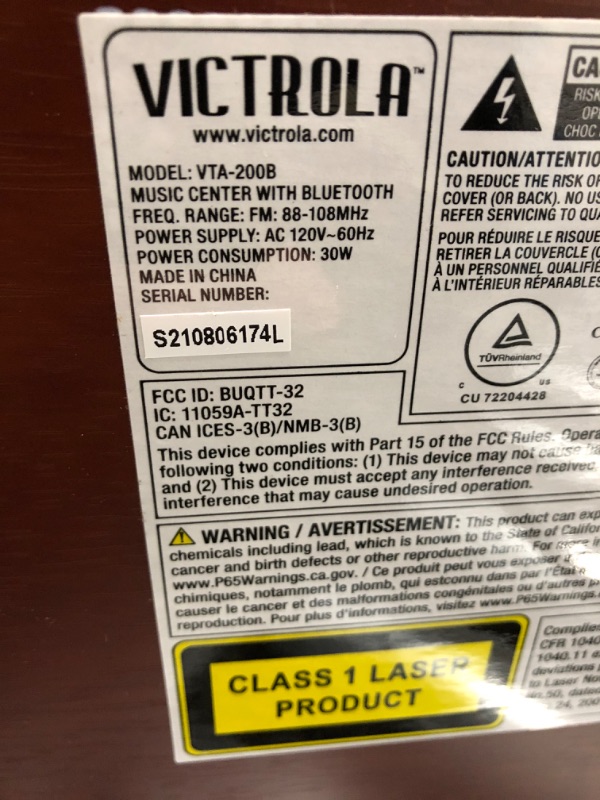 Photo 2 of *Powers On* Victrola Nostalgic 6-in-1 Bluetooth Record Player & Multimedia Center with Built-in Speakers - 3-Speed Turntable, CD & Cassette Player, FM Radio | Wireless Music Streaming | Mahogany Mahogany Entertainment Center