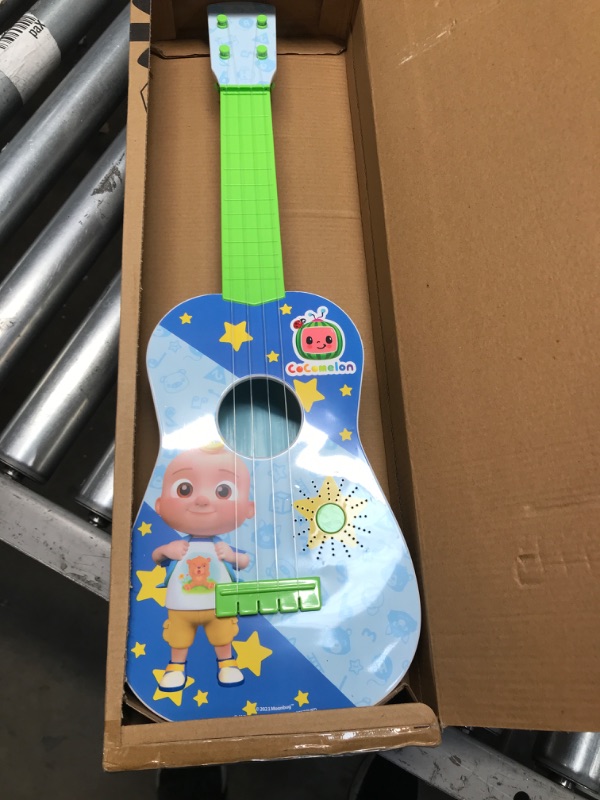 Photo 2 of CoComelon Musical Guitar by First Act, 23.5” Kids Guitar - Plays Clips of The ‘Finger Family’ Song - Musical Instruments for Kids, Toddlers, and Preschoolers