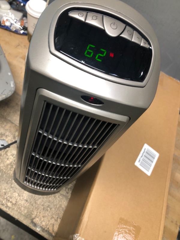 Photo 2 of **missing contoller**
Lasko Oscillating Digital Ceramic Tower Heater for Home with Adjustable Thermostat, Timer and Remote Control, 23 Inches, 1500W, Silver, 755320