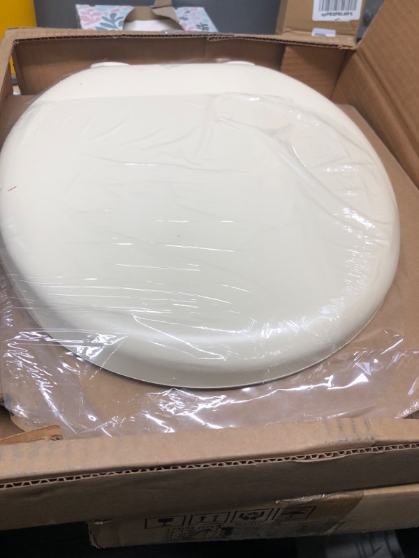 Photo 2 of **opened but not used**
Mayfair 15EC 006 Removable Soft Toilet Seat that will Never Loosen, ROUND - Premium Hinge, Bone 1 Pack Round - Premium Hinge Bone Toilet Seat