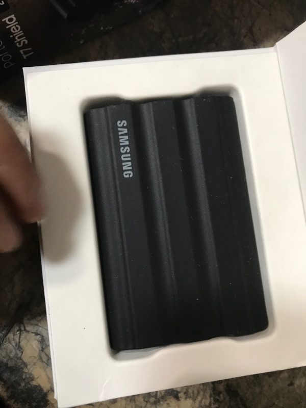 Photo 2 of SAMSUNG T7 Shield 2TB, Portable SSD, up-to 1050MB/s, USB 3.2 Gen2, Rugged, IP65 Water & Dust Resistant, for Photographers, Content Creators and Gaming, Extenal Solid State Drive (MU-PE2T0S/AM), Black Black 2 TB