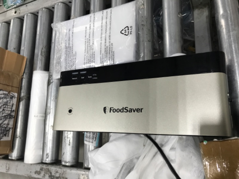 Photo 2 of not functional***FoodSaver VS0150 PowerVac Compact Vacuum Sealing Machine, Vertical Vacuum Sealer Storage, Black
