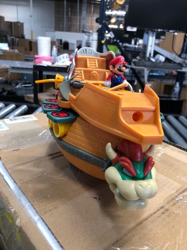 Photo 3 of Super Mario Deluxe Bowser's Air Ship Playset with Mario Action Figure – Authentic In-Game Sounds & Spinning Propellers