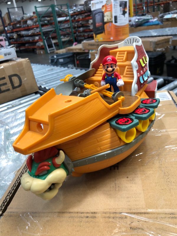 Photo 2 of Super Mario Deluxe Bowser's Air Ship Playset with Mario Action Figure – Authentic In-Game Sounds & Spinning Propellers