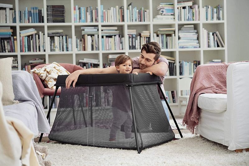 Photo 3 of BabyBjörn Travel Crib Light + Fitted Sheet Bundle Pack, Black, One Size (640001US)
