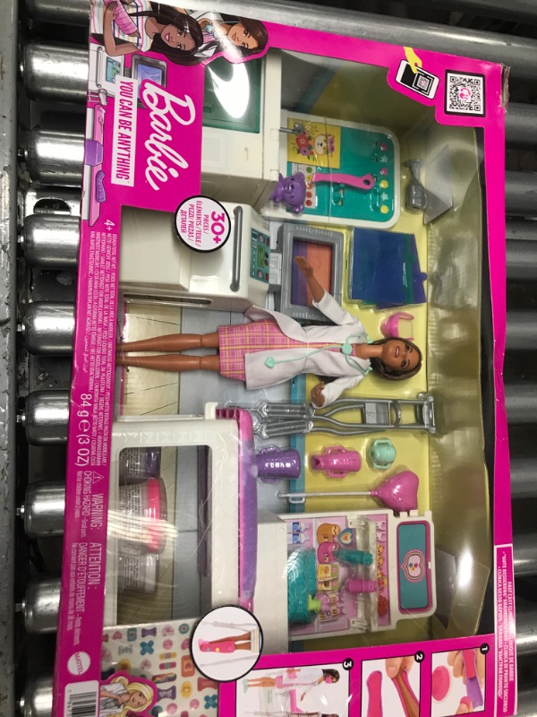 Photo 2 of Barbie Fast Cast Clinic Playset, Brunette Doctor Doll (12-in), 30+ Play Pieces, 4 Play Areas, Cast & Bandage Making, Medical & X-ray Stations, Exam Table, Gift Shop & More, Great Toy Gift