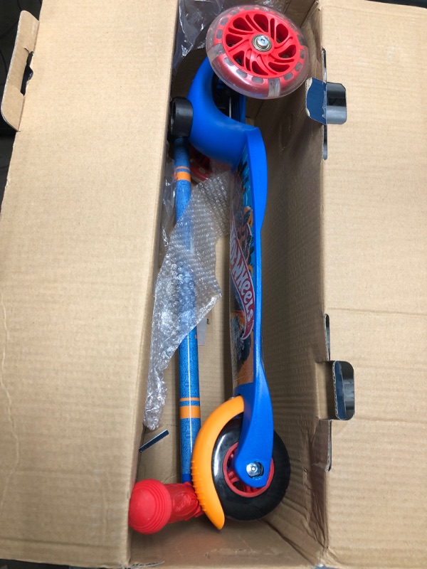Photo 2 of Hot Wheels Self Balancing Kick Scooter with Light Up Wheels, Extra Wide Deck, 3 Wheel Platform, Foot Activated Brake, 75 lbs Limit, Kids & Toddlers Girls or Boys, for Ages 3 and Up