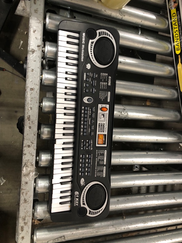 Photo 2 of **missing cables & needs batteries**
61 Key Digital Music Piano Keyboard for Kids,Portable Electronic Musical Instrument,Multi-function Keyboard with Microphone Gifts for Boys and Girls black