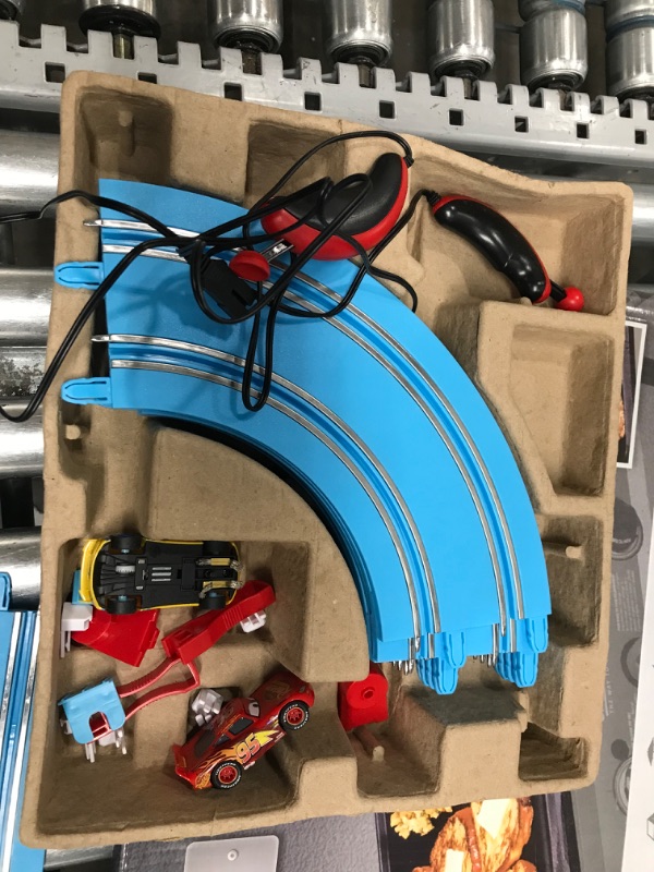 Photo 2 of Carrera First Disney/Pixar Cars - Slot Car Race Track - Includes 2 Cars: Lightning McQueen and Dinoco Cruz - Battery-Powered Beginner Racing Set for Kids Ages 3 Years and Up Disney Cars w/ Spinners