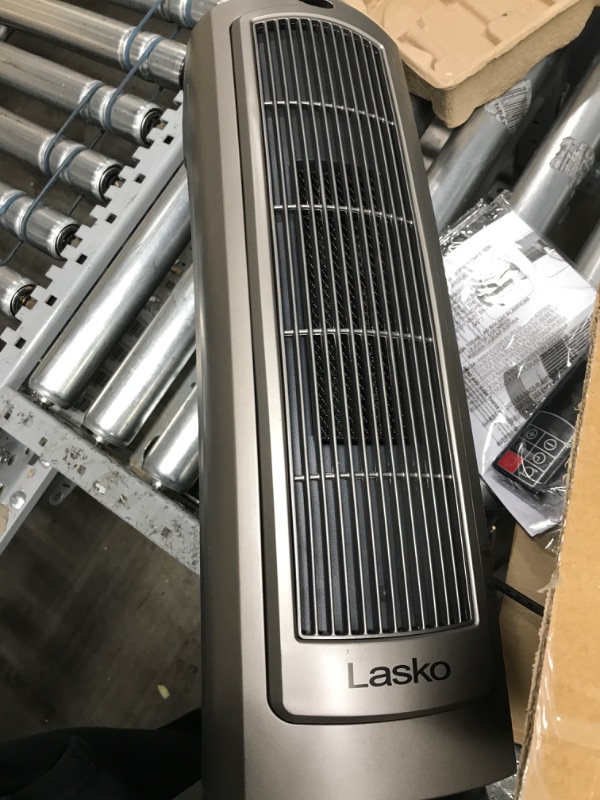 Photo 2 of  *TESTED POWER DID COME ON* Lasko Oscillating Digital Ceramic Tower Heater for Home with Adjustable Thermostat, Timer and Remote Control, 23 Inches, 1500W, Silver, 755320
