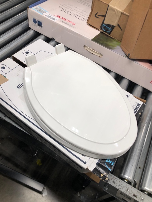 Photo 3 of SCREWS ARE NOT INCLUDED*
Kohler 4734-0 Rutledge Elongated, Grip-Tight Bumpers, Quiet-Close Release Hinges, Quick-Attach Hardware, No Slam Toilet Seat, White Elongated White