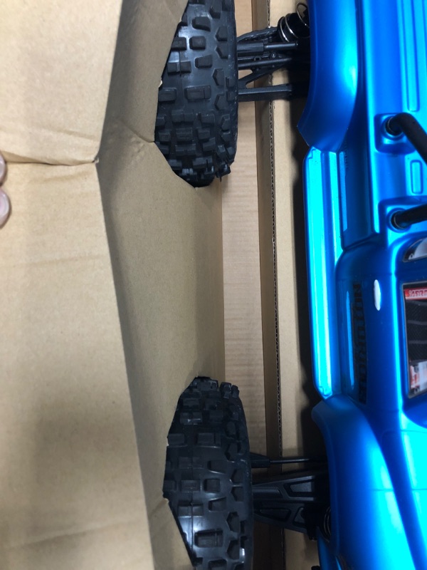 Photo 4 of ARRMA 1/8 Notorious 6S V5 4WD BLX Stunt RC Truck with Spektrum Firma RTR (Transmitter and Receiver Included, Batteries and Charger Required), Blue, ARA8611V5T2