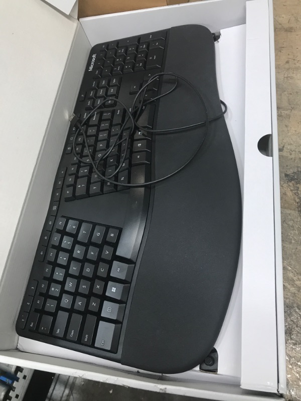 Photo 2 of Microsoft Ergonomic Keyboard - Black. Wired, Comfortable, Ergonomic Keyboard with Cushioned Wrist and Palm Support. Split Keyboard. Dedicated Office Key.