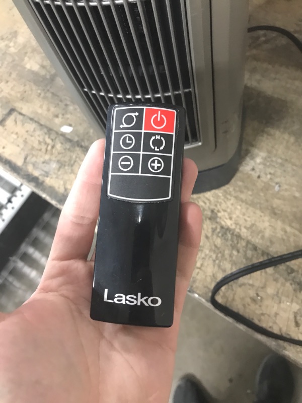 Photo 1 of ***TESTED POWERED ON***Lasko Oscillating Digital Ceramic Tower Heater for Home with Adjustable Thermostat, Timer and Remote Control, 23 Inches, 1500W, Silver, 755320