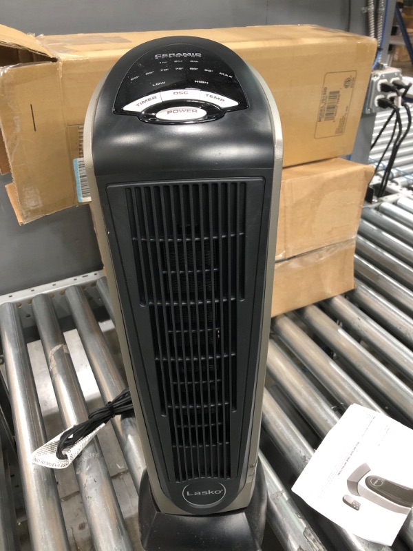 Photo 3 of *** POWERS ON *** Lasko Oscillating Ceramic Tower Space Heater for Home with Adjustable Thermostat, Timer and Remote Control, 22.5 Inches, Grey/Black, 1500W, 751320