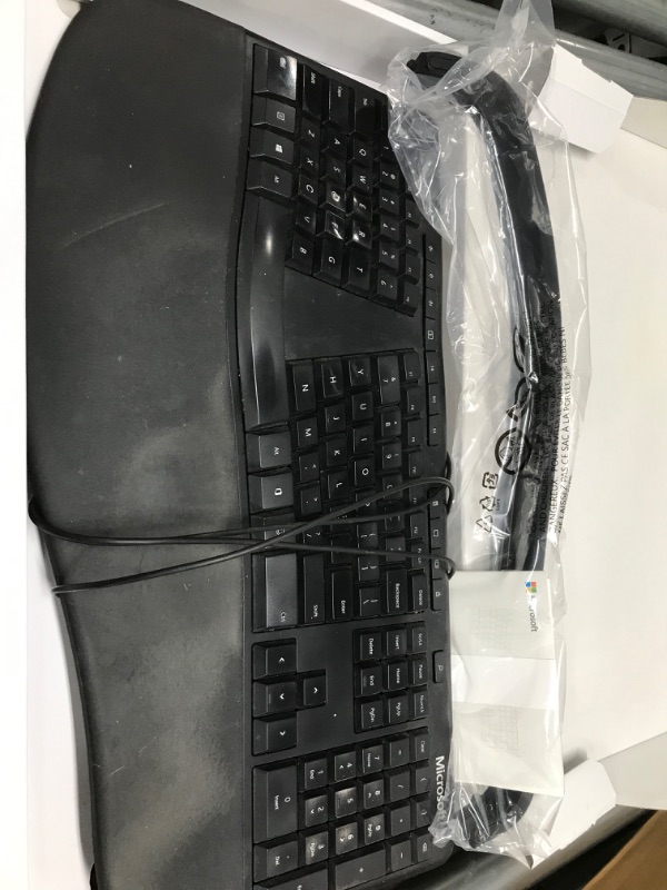 Photo 3 of Microsoft Ergonomic Keyboard - Black. Wired, Comfortable, Ergonomic Keyboard with Cushioned Wrist and Palm Support. Split Keyboard. Dedicated Office Key.