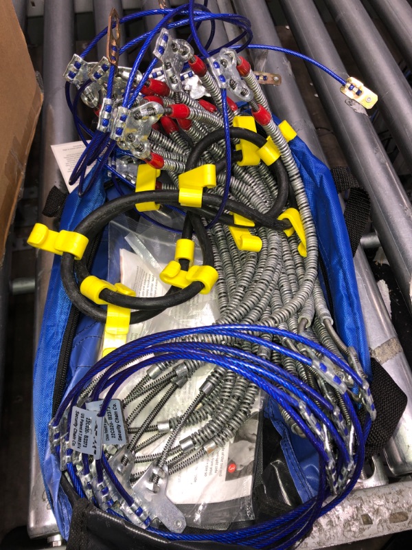 Photo 1 of BAG HAS A TEAR ON GRIP**
Security Chain Sz 7 Snow Cable