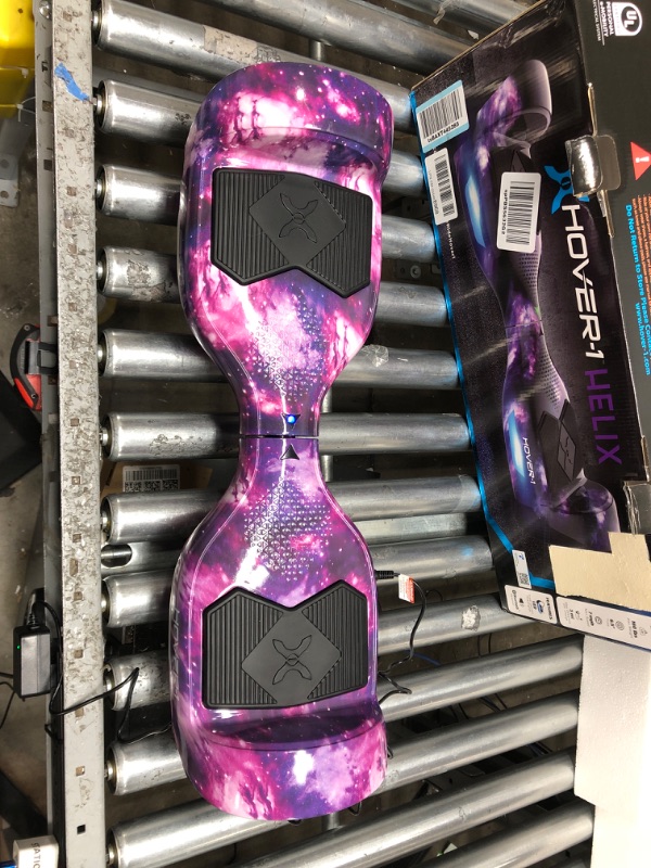 Photo 2 of *DOES NOT TURN ON PARTS ONLY* 
Hover-1 Helix Electric Hoverboard | 7MPH Top Speed, 4 Mile Range, 6HR Full-Charge, Built-in Bluetooth Speaker, Rider Modes: Beginner to Expert Hoverboard Galaxy