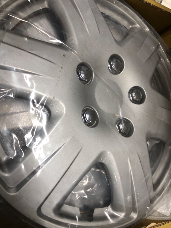 Photo 2 of Four ABS Plastic Silver Colored Hubcaps - 15 Inch Diameter