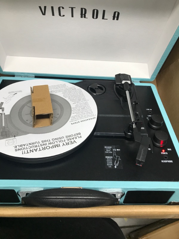 Photo 4 of *** TESTED- POWERS ON*** Victrola Vintage 3-Speed Bluetooth Portable Suitcase Record Player with Built-in Speakers | Upgraded Turntable Audio Sound| Includes Extra Stylus | Turquoise, Model Number: VSC-550BT