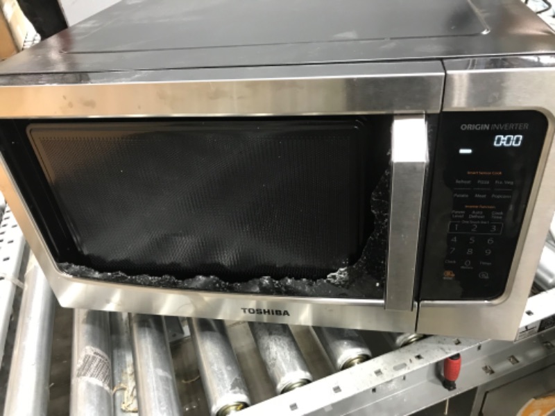 Photo 1 of TOSHIBA 6-in-1 Inverter Microwave Oven Air Fryer Combo, Countertop Microwave, Healthy Air Fryer, Broil, Convection, Speedy Combi, Even Defrost, 11.3’’ Turntable, Eco-Mode, Sound On/Off, 27 Auto Menu
GLASS DOOR DAMAGED
