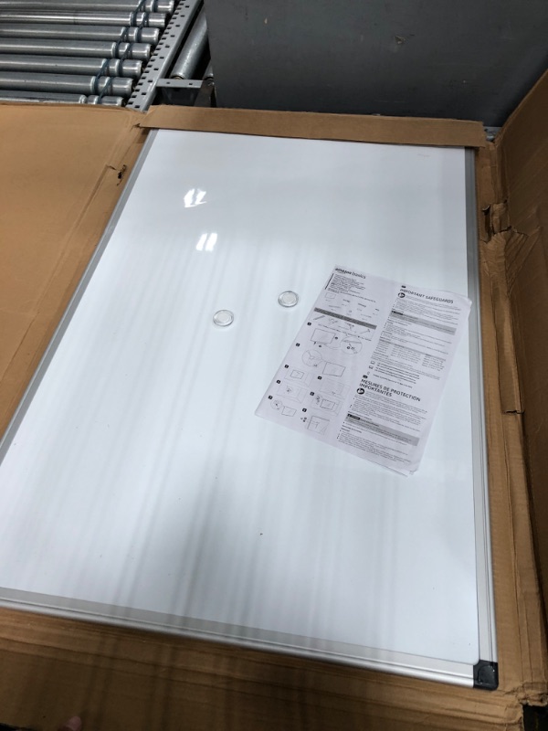 Photo 1 of Amazon Basics Magnetic Dry Erase White Board, 36 x 24-Inch Whiteboard - Silver Aluminum Frame 24" x 36" Magnetic, Aluminum Frame