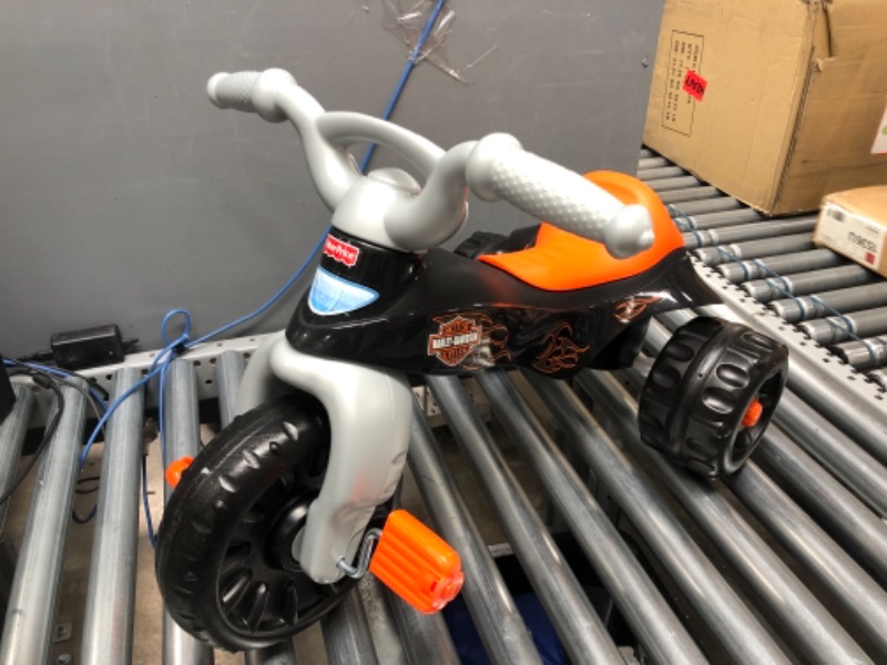 Photo 2 of Fisher-Price Harley-Davidson Tricycle with Handlebar Grips and Storage Area, Multi-Terrain Tires, Tough Trike