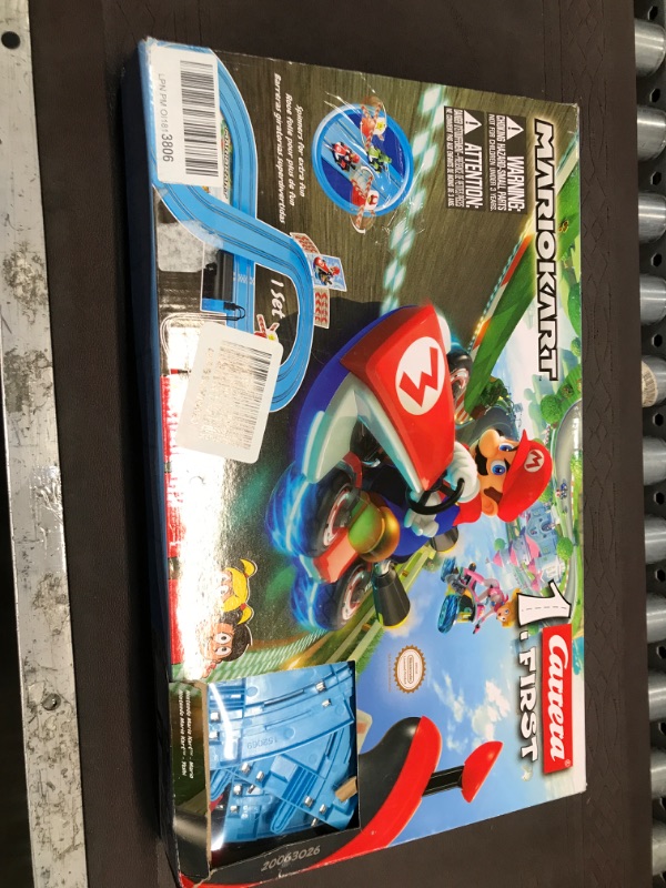 Photo 1 of Carrera First Mario Kart - Slot Car Race Track With Spinners - Includes 2 Cars: Mario and Yoshi - Battery-Powered Beginner Racing Set for Kids Ages 3 Years and Up