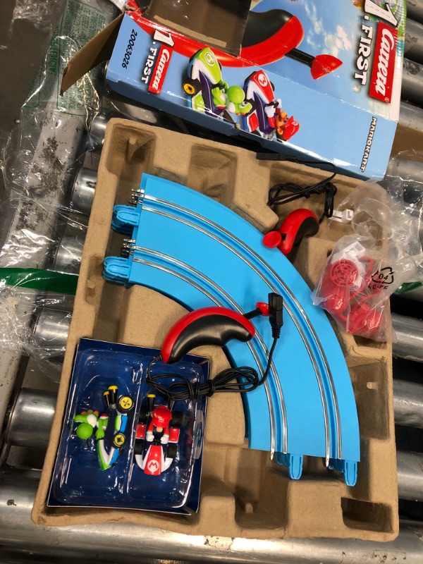 Photo 3 of Carrera First Mario Kart - Slot Car Race Track With Spinners - Includes 2 Cars: Mario and Yoshi - Battery-Powered Beginner Racing Set for Kids Ages 3 Years and Up Mario Kart w/ Spinners