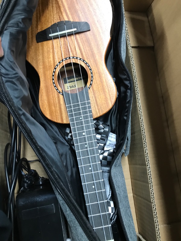 Photo 2 of ***PARTS ONLY*** Acoustic Electric Ukulele and Amplifier Kit 23" Tenor 4 String Professional Mahogany Uke w/ 3W Amp, Strap, 4 Celluloid Picks, Gig Bag, Cleaning Cloth, Strings, For Beginners & Advanced