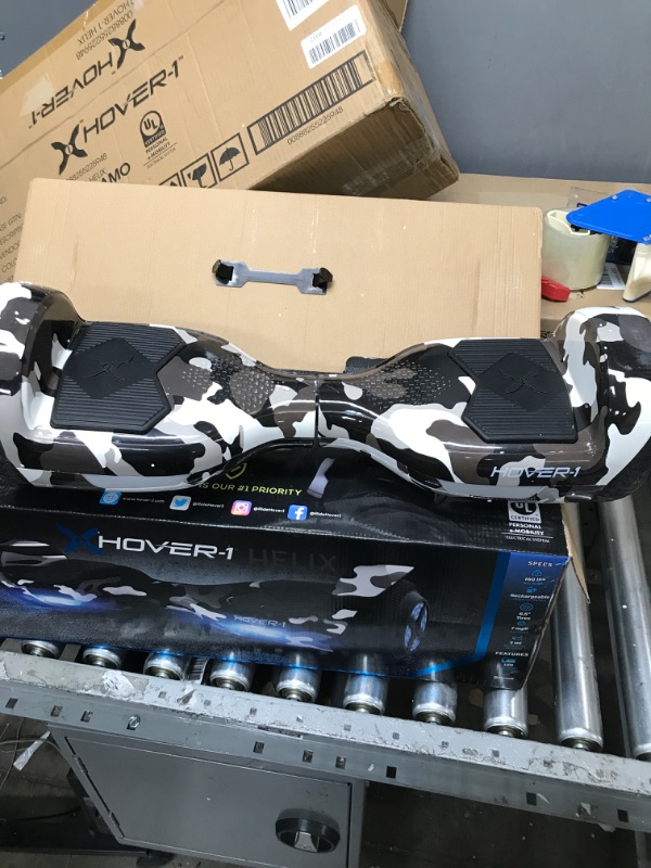 Photo 2 of ***PARTS ONLY*** Hover-1 Helix Electric Hoverboard | 7MPH Top Speed, 4 Mile Range, 6HR Full-Charge, Built-in Bluetooth Speaker, Rider Modes: Beginner to Expert Hoverboard Camo