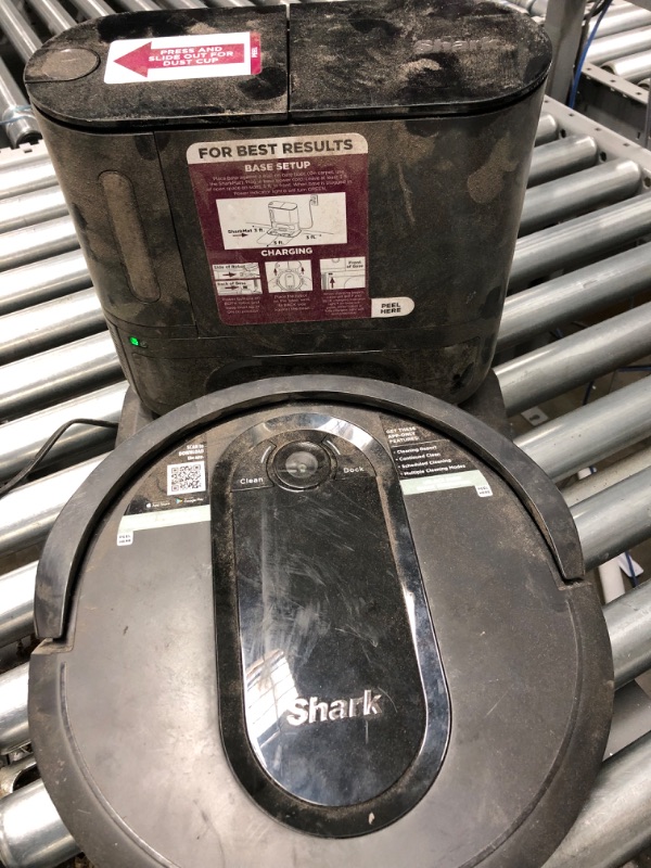 Photo 4 of *DOES NOT FUNCTION PARTS ONLY* Shark RV912S EZ Robot Vacuum with Self-Empty Base, Bagless, Row-by-Row Cleaning, Perfect for Pet Hair, Compatible with Alexa, Wi-Fi, Dark Gray EZ Robot + 30 Day Capacity
VERY DIRTY NEEDS CLEANING NEEDS REPAIRS