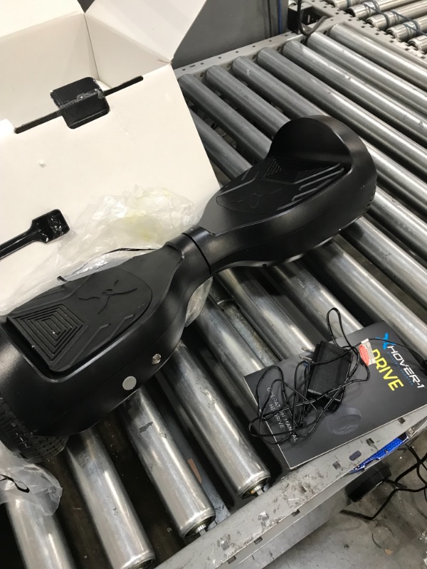 Photo 2 of *** TESTED- FUNCTIONAL***Hover-1 Drive Electric Hoverboard | 7MPH Top Speed, 3 Mile Range, Long Lasting Lithium-Ion Battery, 6HR Full-Charge, Path Illuminating LED Lights - Black