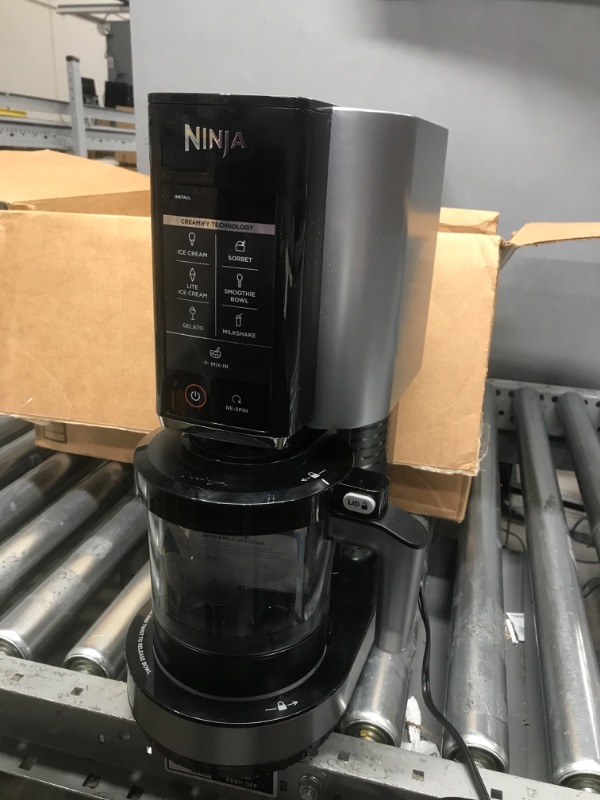 Photo 3 of **PARTS ONLY** Ninja NC301 CREAMi Ice Cream Maker, for Gelato, Mix-ins, Milkshakes, Sorbet, Smoothie Bowls & More, 7 One-Touch Programs, with (2) Pint Containers & Lids, Compact Size, Perfect for Kids, Silver Silver 7 Functions + (2) 16 oz. Pints